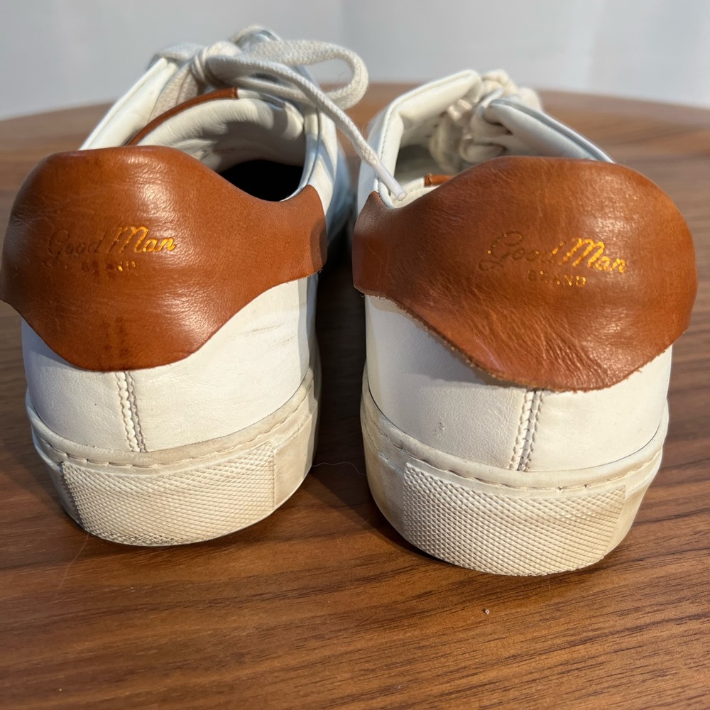 Mens white Goodman low sneakers. Size us11.